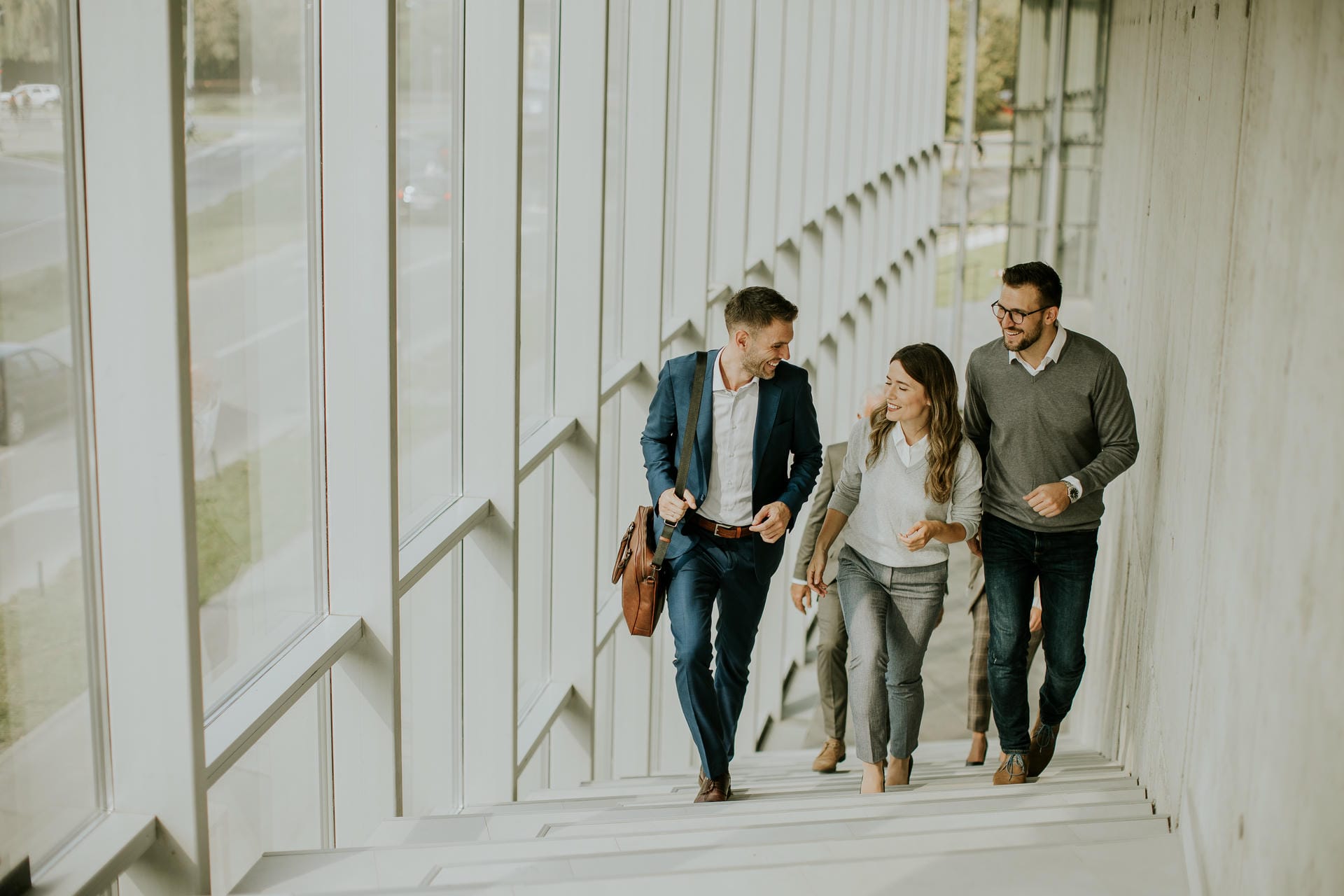 Colleagues walking through the Belgrade office