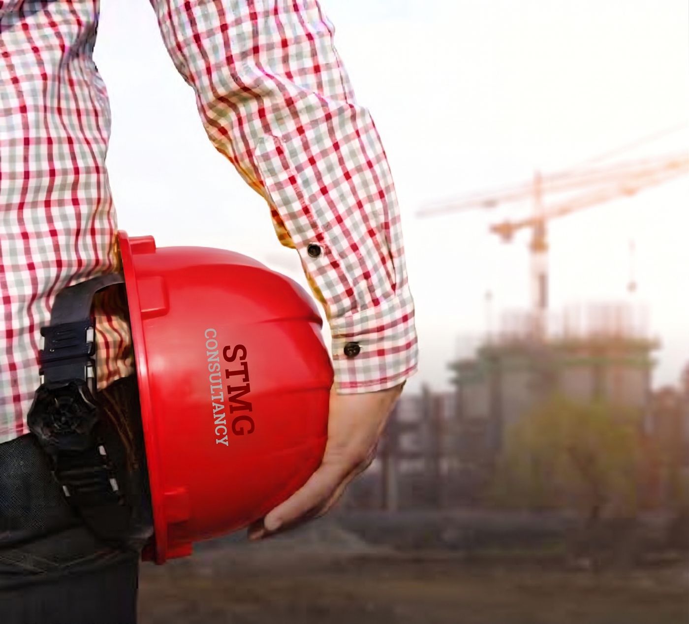 STMG hard hat on a construction site